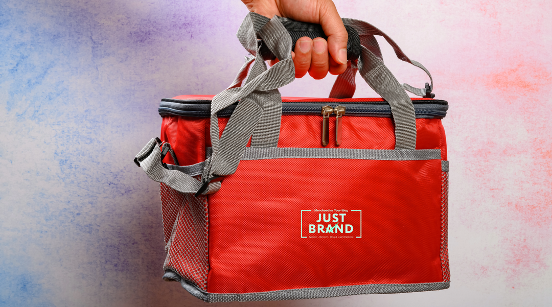 A branded school lunch bag being held - lunch bag - school lunch box