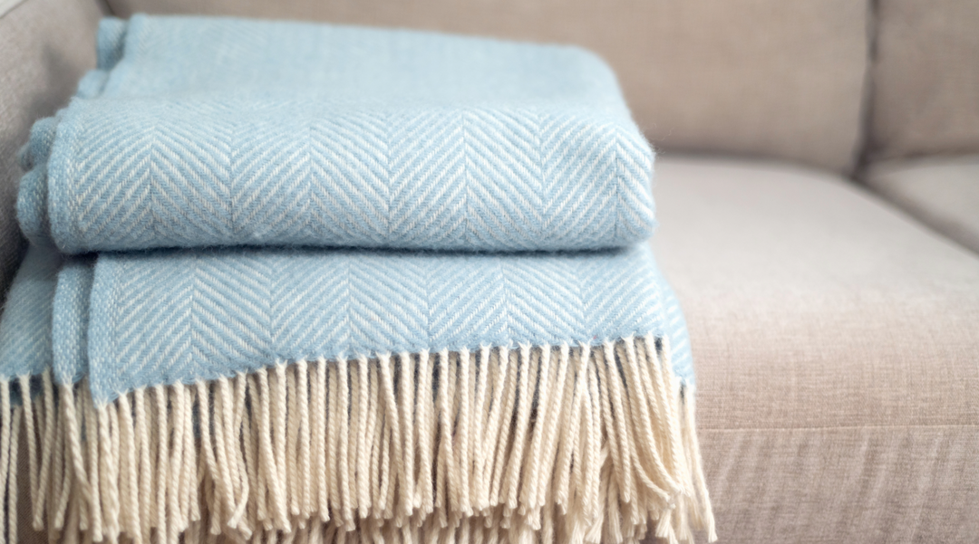 Blue tassled blanket on couch - winter blanket - Blanket