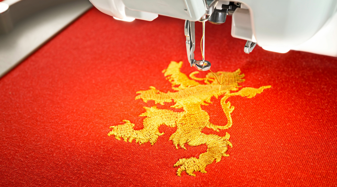 Embroidery taking place on shirt - branded tee shirts - t shirt
