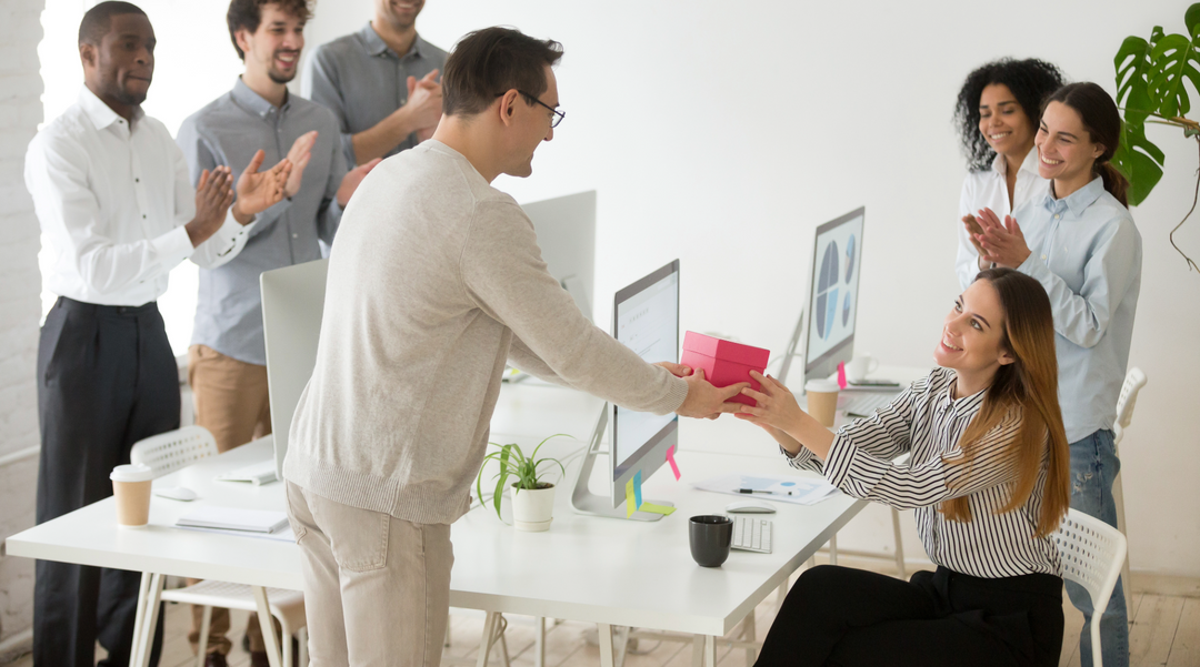 Employee receiving gift - corporate gift ideas - corporate gifts