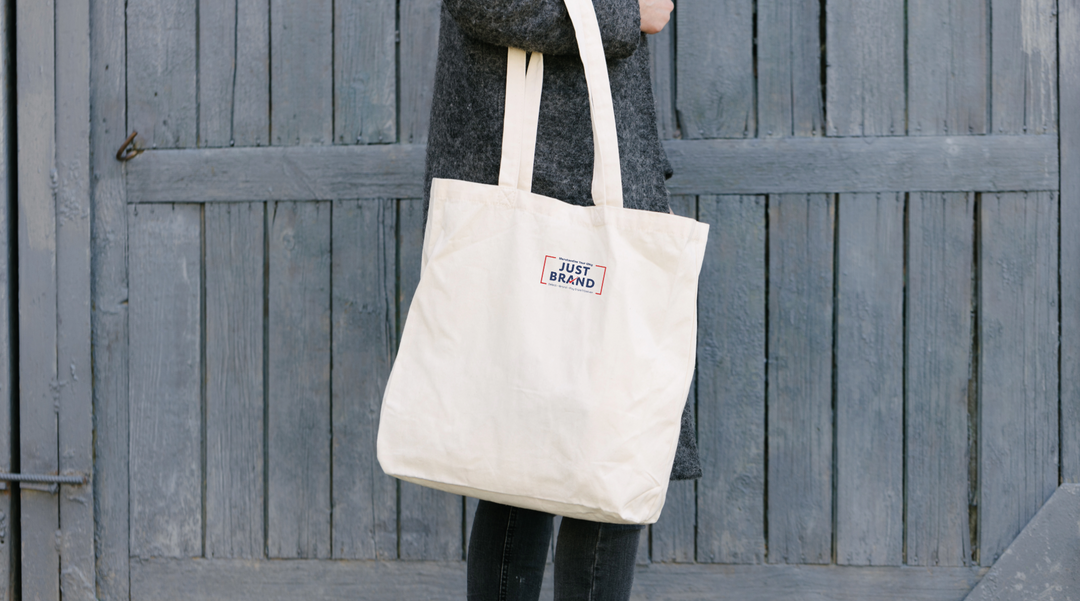 Lady holding branded bag - bags south africa - Bag