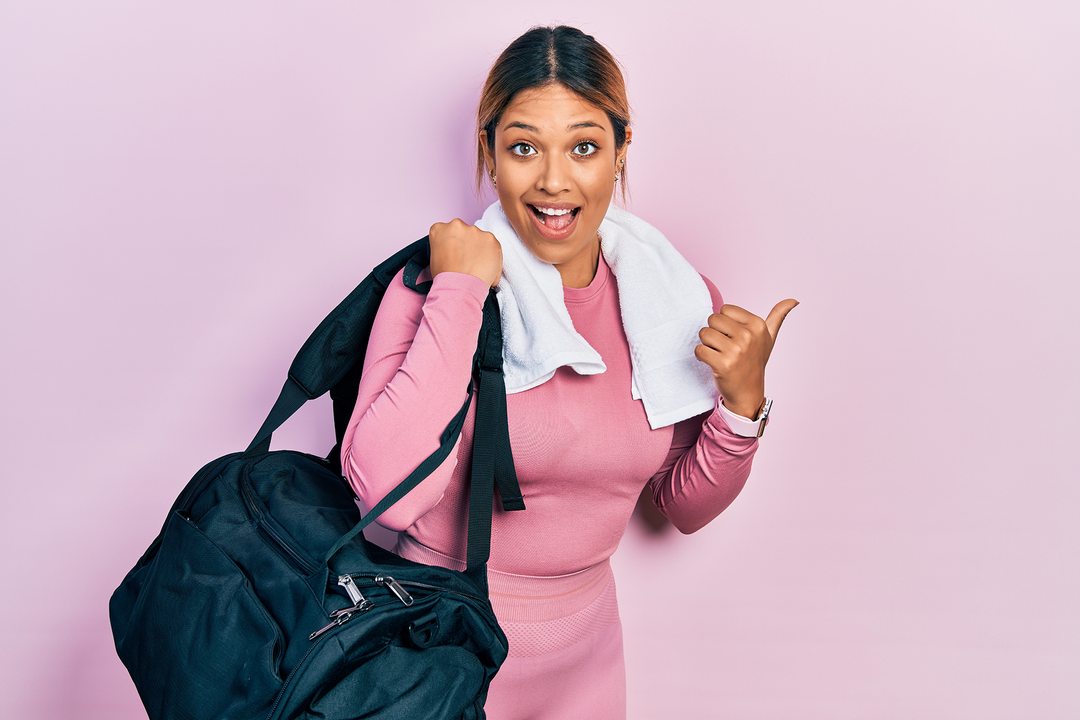 Lady with Sports bag over shoulder - sports gym bag - sports bag