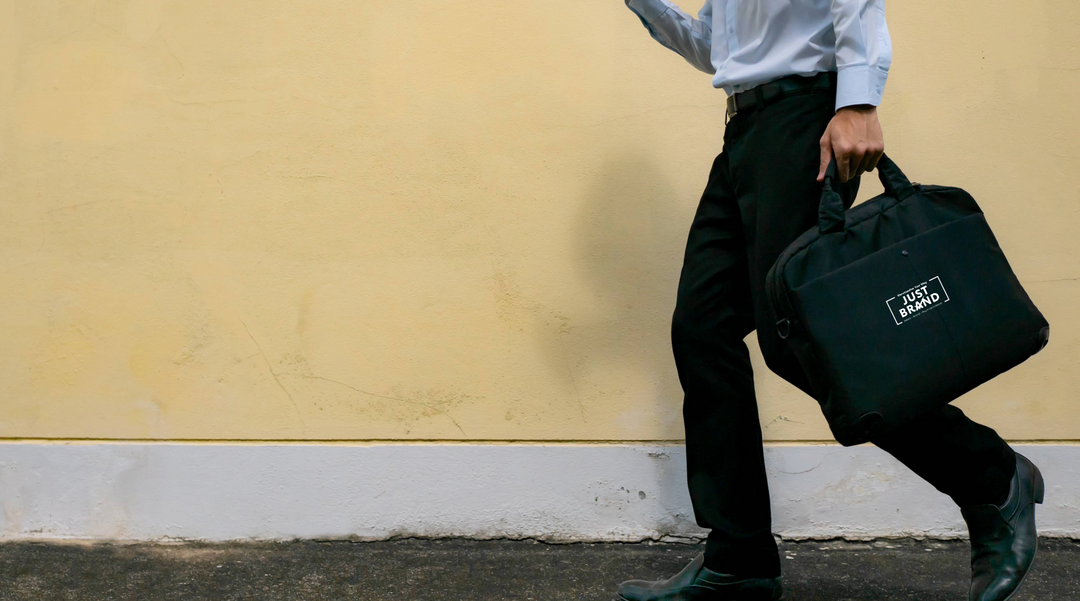 Man carrying branded laptop bag - laptop bag - personalised laptop bag