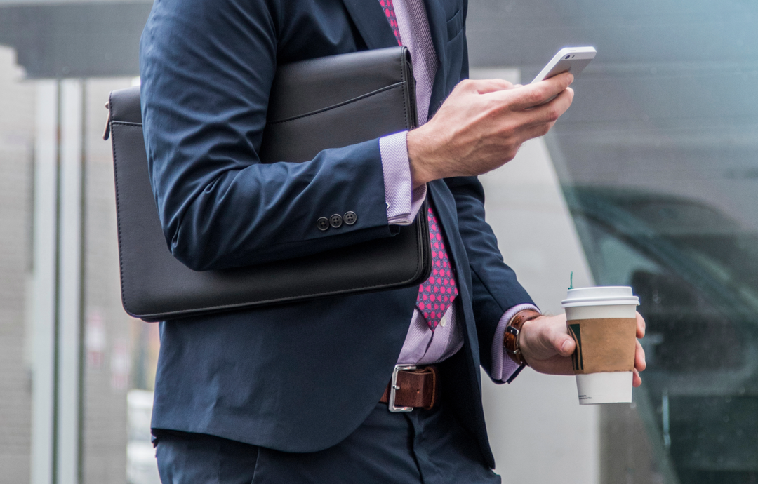 Man holding document folder under arm - document folder - executive gift sets