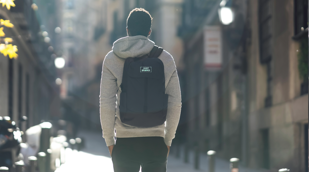 Man walking with branded backpack - Backpack - travel backpack