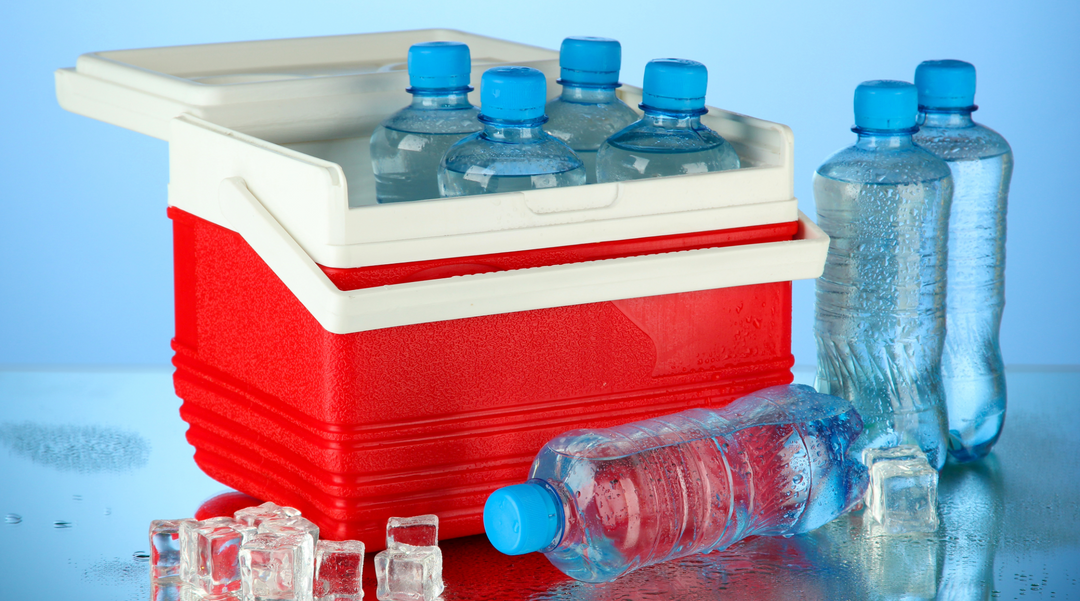Small red cooler box with water bottles in - small cooler box - cooler bag