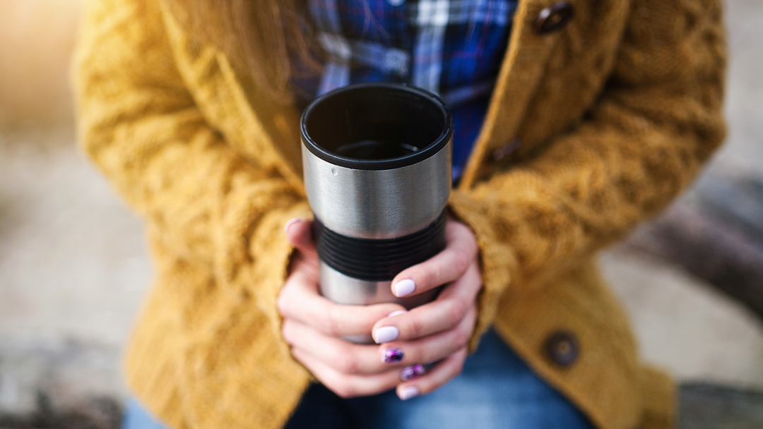 Travel mug in hand - travel coffee mugs - travel mugs south africa