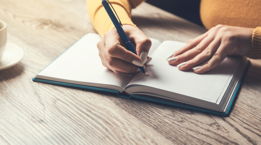 Woman writing in a diary - Diary - personalised diary