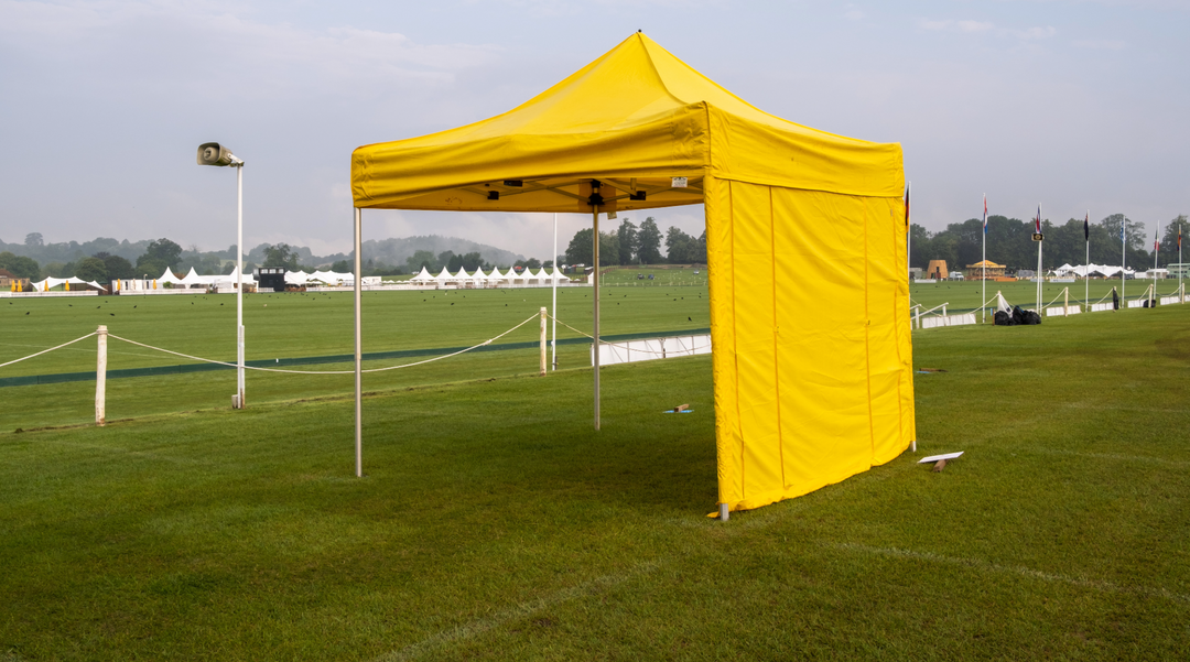 Yellow gazebo being set up - Gazebo - branded gazebo